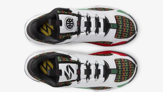 View of Luka Doncic's white, black, and green Jordan Brand sneakers.